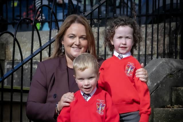 St. Eugene's new Principal, Mrs. Aine Deane pictured with P1 pupils. (Photos: Jim McCafferty Photography)