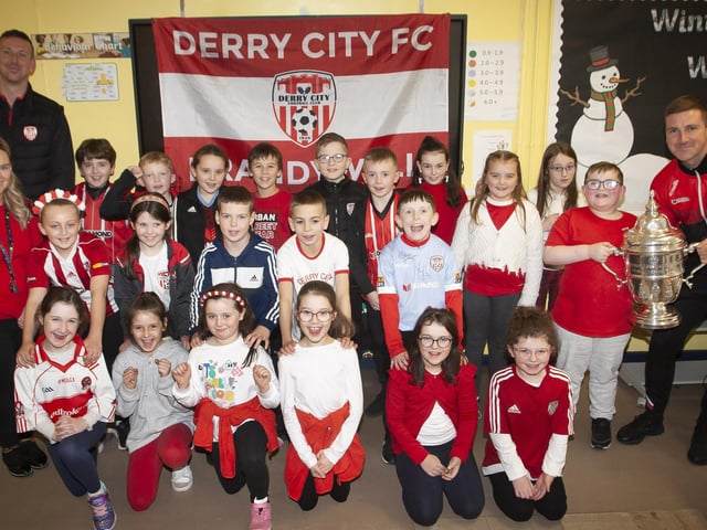 Shane and Patrick McEleney with Mrs. O’Hara with her Primary 5 class. (Photo: Jim McCafferty)