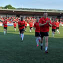 Shane McEleney leads the Derry City team into the dressing room at Brandywell.