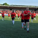 Shane McEleney leads the Derry City team into the dressing room at Brandywell.