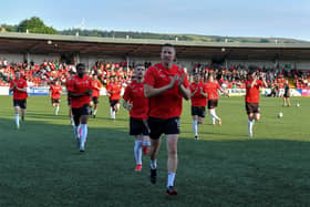 Shane McEleney leads the Derry City team into the dressing room at Brandywell.