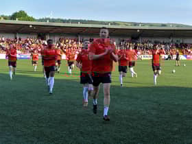 Shane McEleney leads the Derry City team into the dressing room at Brandywell.
