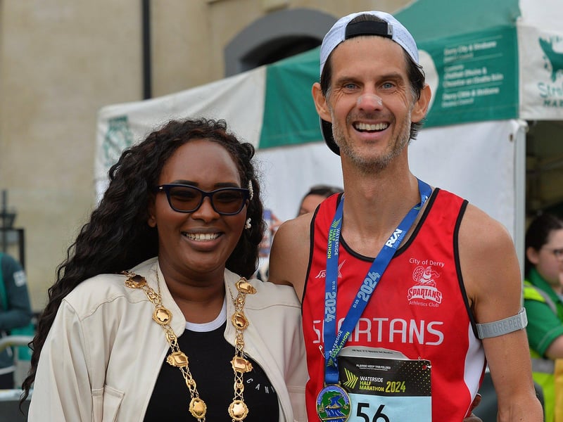 2024 Waterside Half Marathon second placed Allan Bogle,City of Derry Spartans, pictured with Mayor Lilian Seenoi Barr. Photo: George Sweeney