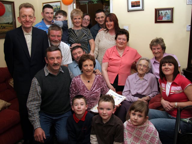 Birthday girl Elizabeth surrounded by friends and family on the occasion of her 90th birthday 0044JML : Parties and celebrations April 2006: Elizabeth Doherty.