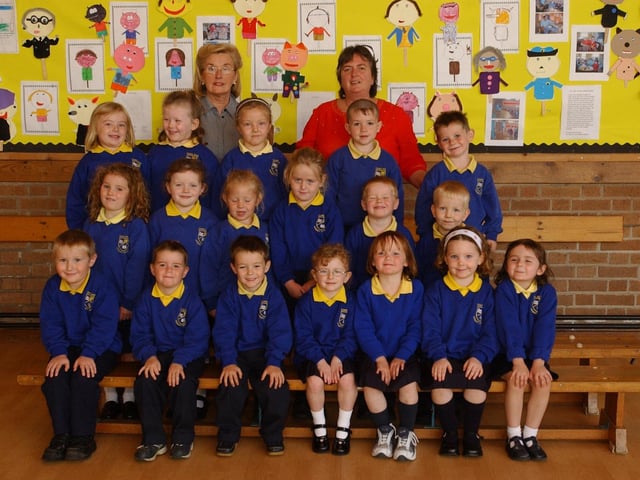 Primary 1 pupils from Chapel Road Primary School pictured with, from left, Phil Caldwell, classroom assistant, and Catherine Keaveney, teacher. (1909PG06):20 years on: Young people across Derry and Donegal starting school in September 2003