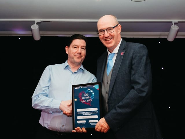 Dr Brendan Lavery accepts highly commended Lifetime Achievement award on behalf of Dr Paul Baylis.