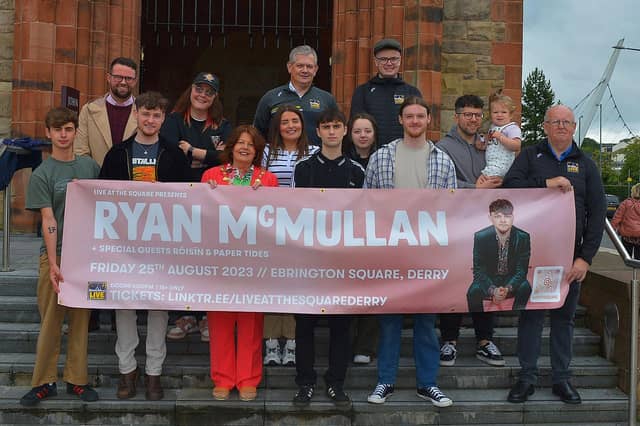 Mayor Patricia Logue pictured with singer Ryan McMullan, backing artists Cheryl Ann and TeleZura , event officials and the Starrs family who won tickets to the event at the official launch of his forthcoming gig ‘Live in the Square’, Ebrington on 25th August. Photo: George Sweeney. DER2331GS – 67