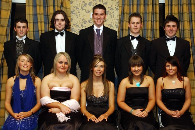 Front, from left, are Carole Neff, Caoimhe McNulty, Michelle McShane, Catriona Devine and Tara McGinley. Back, from left, are Gavin Scallon, Terry Rankin, Niall O'Kane, Robert McHugh and Michael Friel. (1611C08) : Students and their guests pictured at the St Columb's College formal back in November 2004.