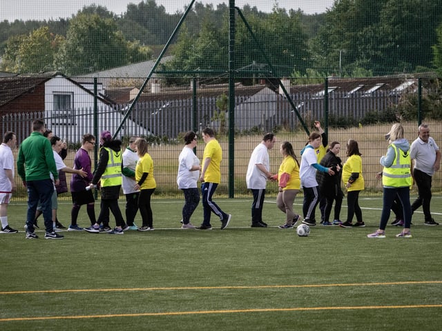 Handshakes all round after a group match in the Annual Peace Games.