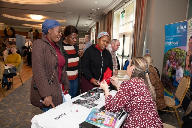 Bronagh Doyle from Alone with visitors to the HSE & IDP Health, Social Care Recruitment  &  Education Fair in Inishowen Gateway Hotel on Tuesday last. Photo Clive Wasson