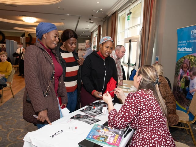 Bronagh Doyle from Alone with visitors to the HSE & IDP Health, Social Care Recruitment & Education Fair in Inishowen Gateway Hotel on Tuesday last. Photo Clive Wasson