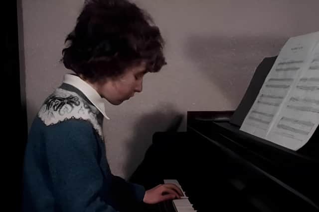 Ronan pictured playing the piano that eventually became the property of Johnny McDaid of Snow Patrol fame.