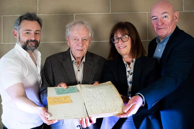 From left, Kieran Griffiths, Séan Farren, Helen McManus and Mark Durkan, former SDLP leader and deputy First Minister, pictured holding the minutes of the first Derry Credit Union meeting.