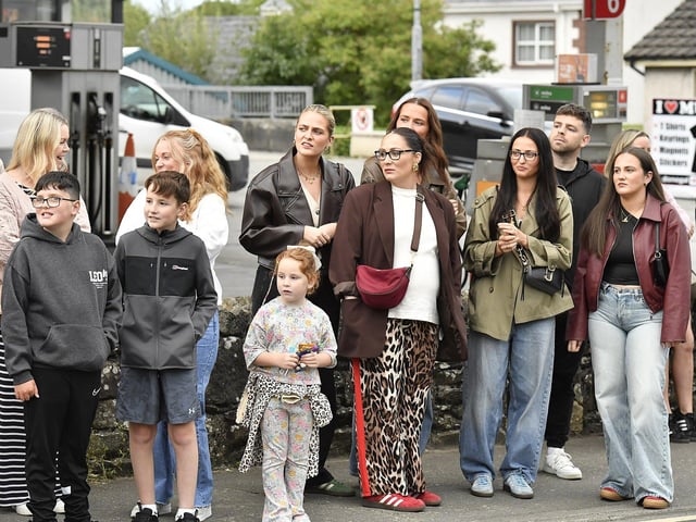 Spectators at the Muff Feile opening parade makes on Friday evening. Photo: George Sweeney