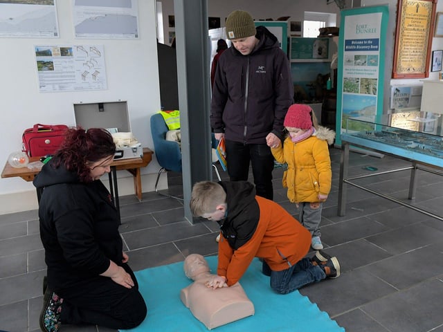 People of all ages participated in the Irish Red Cross’s CPR First Aid demonstration at the Emergency Services Showcase held at Fort Dunree, Inishowen, on Sunday. Photo: George Sweeney