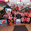 Group pictured at the launch of the Drive 105 and O’Nellls ‘Big Send off for FAI Cup finalists Derry City’. Included in the photograph are Bishop Donal McKeown, Martin Mullan,  Anna Doherty, Chief Executive, Londonderry Chamber, Steve Bradley, Into the West, local councillors, fans, Drive 105’s Noel Moore and Caroline Ryan, manager of O’Neills Sports store. Photo: George Sweeney