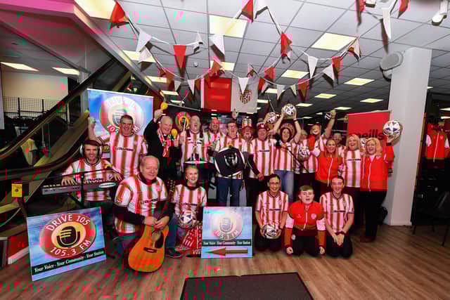 Group pictured at the launch of the Drive 105 and O’Nellls ‘Big Send off for FAI Cup finalists Derry City’. Included in the photograph are Bishop Donal McKeown, Martin Mullan, Anna Doherty, Chief Executive, Londonderry Chamber, Steve Bradley, Into the West, local councillors, fans, Drive 105’s Noel Moore and Caroline Ryan, manager of O’Neills Sports store. Photo: George Sweeney