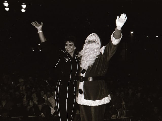 Santa, with help from TV Gladiator Falcon, also known as Bernadette Hunt, switched on the Derry Christmas lights.