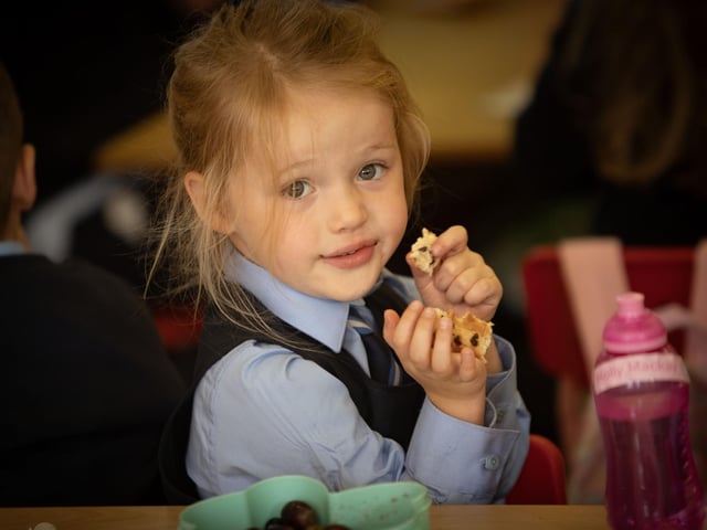Snack time for P1 pupil Molly at Hollybush PS.