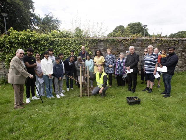 TREE PLANTING IN MEMORY OF REUVEN AND JOSEPH. . . .St. Columb's Park on Saturday saw the planting of three trees in memory of two young men from the Kerala community, Reuven Simon and Joseph Sebastian, who died after getting into difficulty at Enagh Lough in Derry in August, 2022. The tree planting, oganised by Enagh Seniors Group saw the Mayor, Lillian Seenoi-Barr join the families, local clergy and former school friends of the boys from St. Columb's College. (Photos: Jim McCafferty Photography)