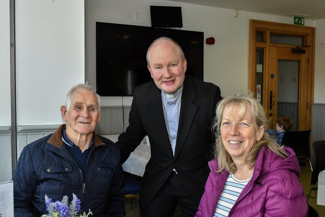 Pat and Dolores Scullion pictured with Father Gerard Mongan, Administrator, Long Tower Church, in the Cloisters Café based in Aras Cholmcille. Photo: George Sweeney