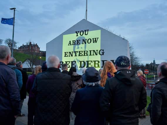 One of the images of 269 victims of state violence that were projected onto Free Derry Wall during Monday evening’s protest against the British government’s controversial Legacy Bill. The protest was organised by the Bloody Sunday Trust and the Pat Finucane Centre.  Photo: George Sweeney.  DER2313GS – 10