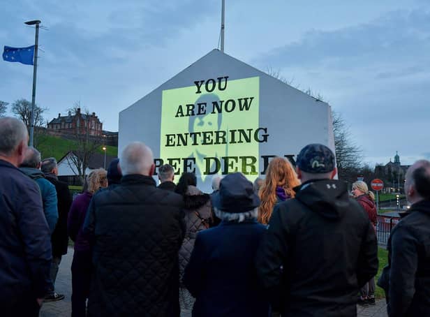 One of the images of 269 victims of state violence that were projected onto Free Derry Wall during Monday evening’s protest against the British government’s controversial Legacy Bill. The protest was organised by the Bloody Sunday Trust and the Pat Finucane Centre.  Photo: George Sweeney.  DER2313GS – 10