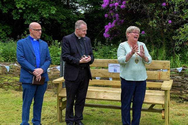 Deputy Mayor Angela Dobbins speaks at the unveiling of Life After’s memorial bench beside St Columb’s Pak House. Included in the photo are Canon David McBeth and Fr Sean O’Donnell. Photo: George Sweeney. DER2321GS - 160