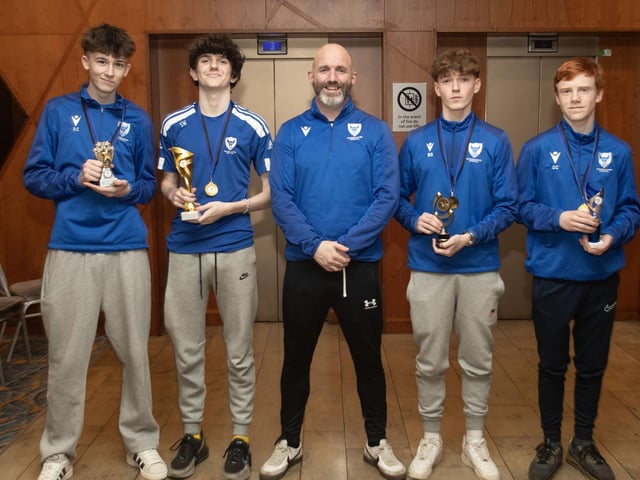 Oxford 2009 coach Darren Walker pictured with main prizewinners, from left Ryan Cauley, top goalscorer, Sean Walker, coaches player of the year, Bobby Rogers, most improved player, and Oscar Collins, players player of the year.