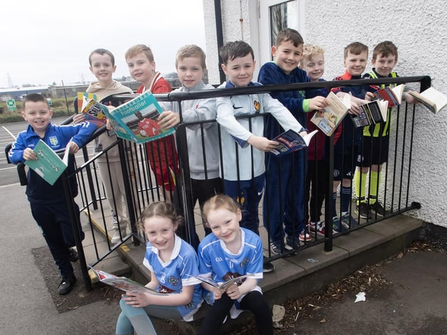 Taking time out for a read during breaktime at Hollybush PS on Thursday.