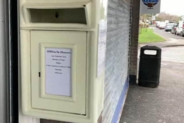 White post boxes for Letters to Heaven.