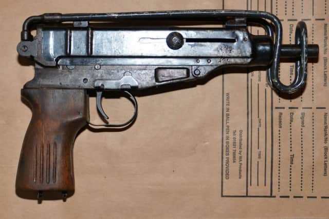 A machine pistol recovered by police in Rosemount on Friday