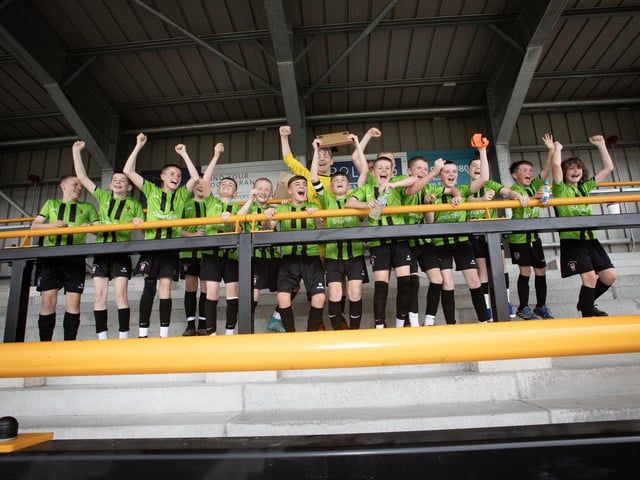 The victorious St. Joseph's Boys celebrate victory on Thursday. (Photo: Jim McCafferty Photography)