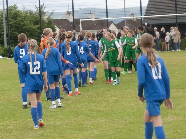 Handshakes all round in the game between Crumlin Stars and Ballinamallard at St. Cecilia's College in the u-13 Girls Foyle Cup on Tuesday morning.
