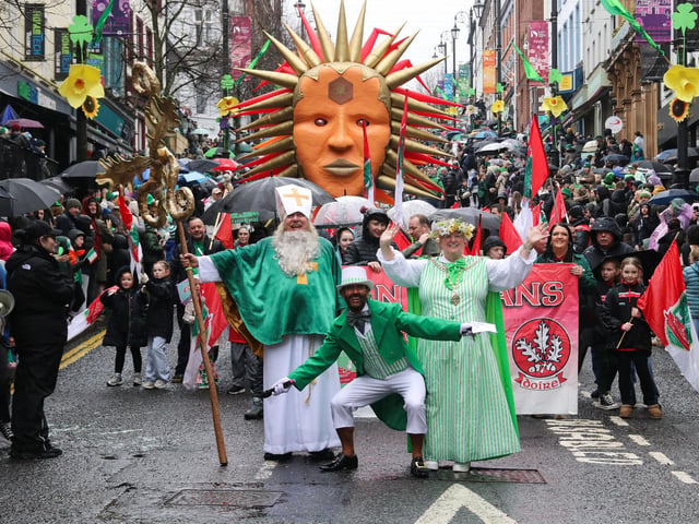 Local celebrity Mickey Doherty and Deputy Mayor Niree McMorris with St. Patrick, leading the St. Patrick’s Day Parade coming down Shipquay Street. (Photo - Deirdre Heaney, nwpresspics)