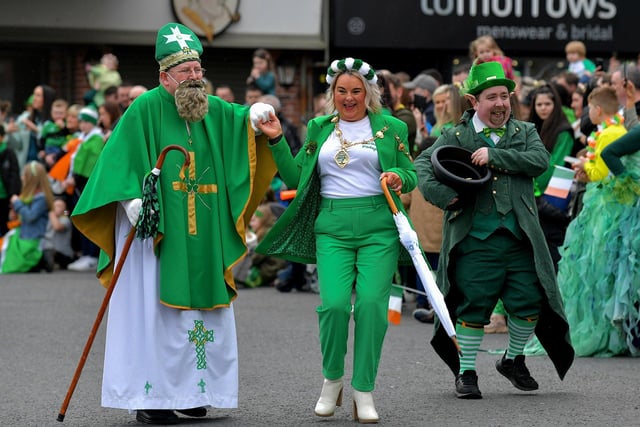 St Patrick, Mayor Sandra Duffy and a leprechaun at Derry‘s St Patrick’s Day parade on Friday afternoon. Photo: George Sweeney. DER2311GS – 58 