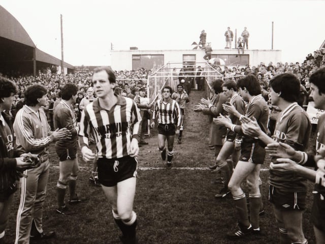 Players, club officials and staff and fans as Derry City FC face Finn Harps FC at Ballybofey in their first league meeting.