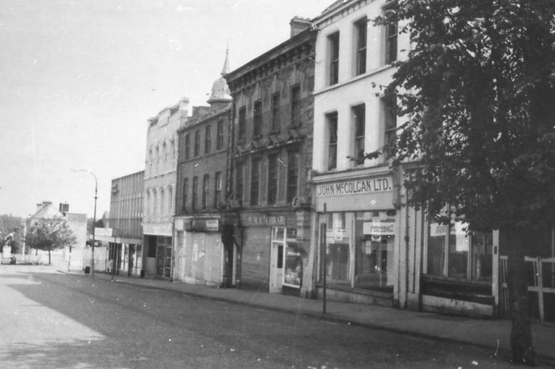 Bishop Street, early 1970s, showing some famous old shops from the past, among them McColgan's Hardware Store and Gilmour's Furniture Store.