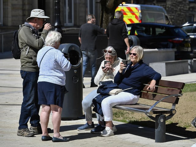 Enjoying a chat in the sunshine. Photo: George Sweeney
