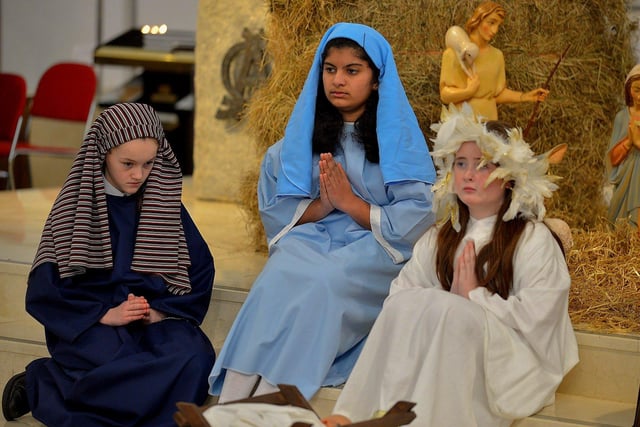 Students from St Cecilia’s College take part in a Nativity scene during a Carol Service held in St Mary’s Church, Creggan, on Tuesday afternoon. Photo: George Sweeney. DER2251GS – 04
