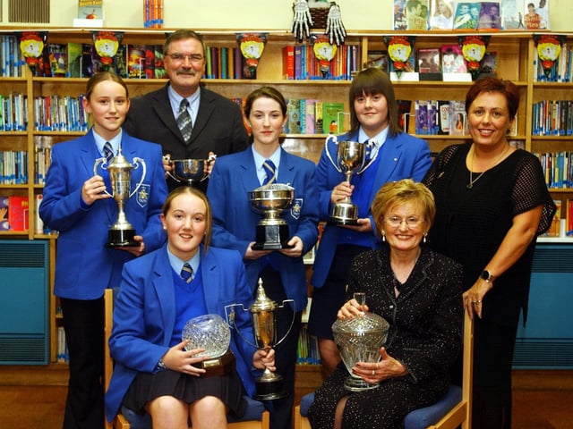 Group pictured at the St Mary's College annual prizegiving. Inluded, seated, from let, are Colleen O'Reilly, Best A level, Headmistresses Award, Step Up Science award and Dupont Trophy, and Dame Geraldine Keegan, principal, back from left, are Shauna Lynch, Quigg Cup, Tommy Doherty, Board of Governors trophy for community service to school, Rebecca Durnin, Best GCSEs, Elaine Curran, special service to school and Deirdre Hamill, guest speaker. (1510A14)