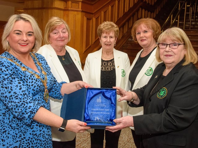 The Mayor Councillor Sandra Duffy pictured with Musicial Director, Sheila Carlin amd founding members, Ursula Clifford
Anne Gallagher and Angela Morrison as she welcomed the members of Colmcille Ladies Choir to a reception in the Guildhall as they mark their 50th Anniversary. Picture Martin McKeown. 20.01.23:.