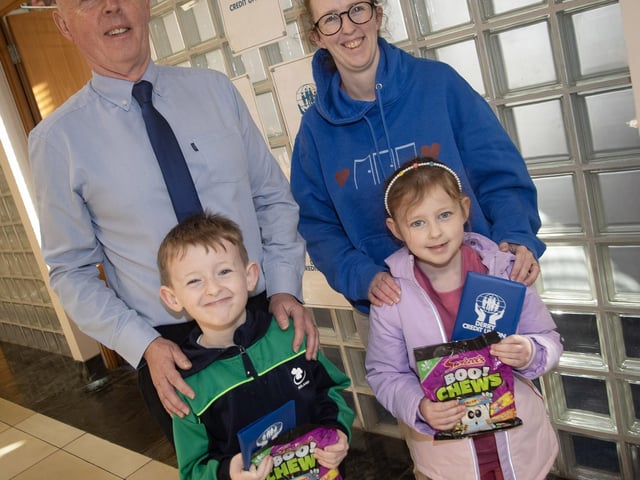 The Credit Union's Michael Gallagher pictured with Joanne McQuaid and her children Saoirse and Daniel on Saturday. : .