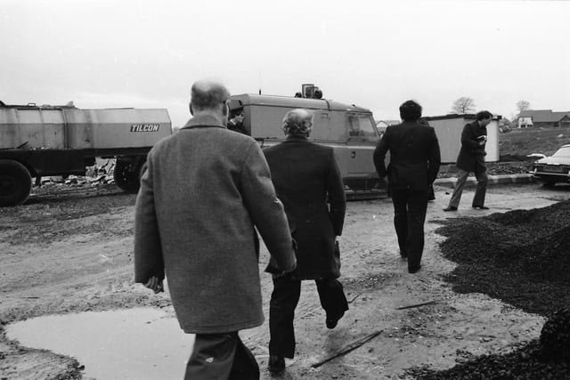 SDLP Leader John Hume with construction firm representatives and dignitaries during a visit by the European Commissioner for European Commissioner for Taxation, Consumer Affairs, Transport and Parliamentary Relations,  and Inter-institutional Relations and Administration, Richard Burke.