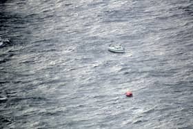 The damaged yacht of an American sailor who was rescued 700 miles off the coast of Ireland.