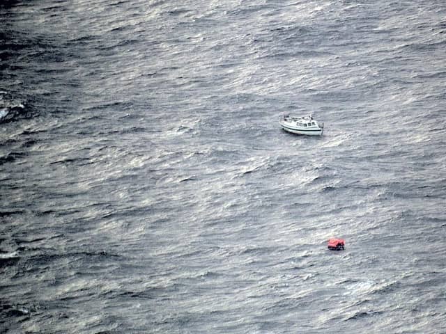 The damaged yacht of an American sailor who was rescued 700 miles off the coast of Ireland.
