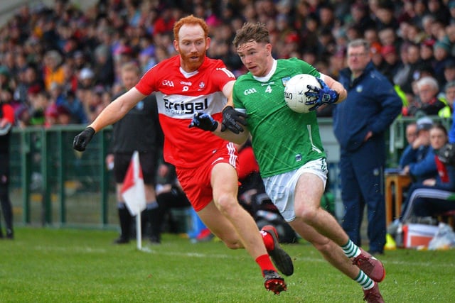 Derry’s Conor Glass battles with Limerick’s Barry Colman during their Division Two game at Owenbeg on Saturday afternoon. P4105GS –