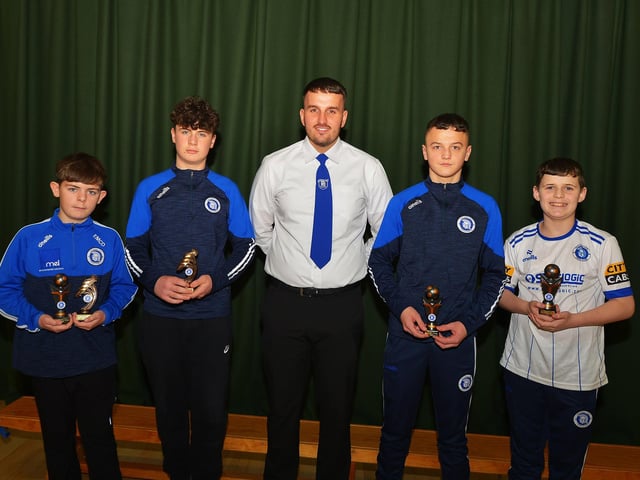 Over 12 years old award winners pictured with vice-chairperson, Diolain Ward, at the Trojans FC annual Youth Presentation held in St Cecilia’s College. Photo: George Sweeney