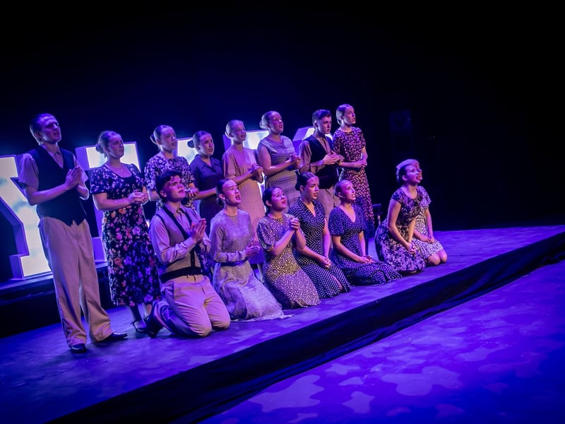 The cast of Evita performing on stage at the Millennium Forum on Friday night.