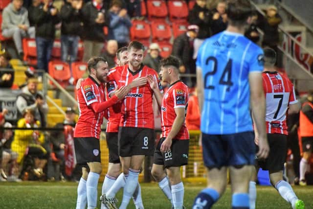 Will Patching celebrates with his teammates after his sublime strike against UCD. Photograph by George Sweeney.